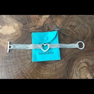 Authentic Tiffany heart and chain mail bracelet.